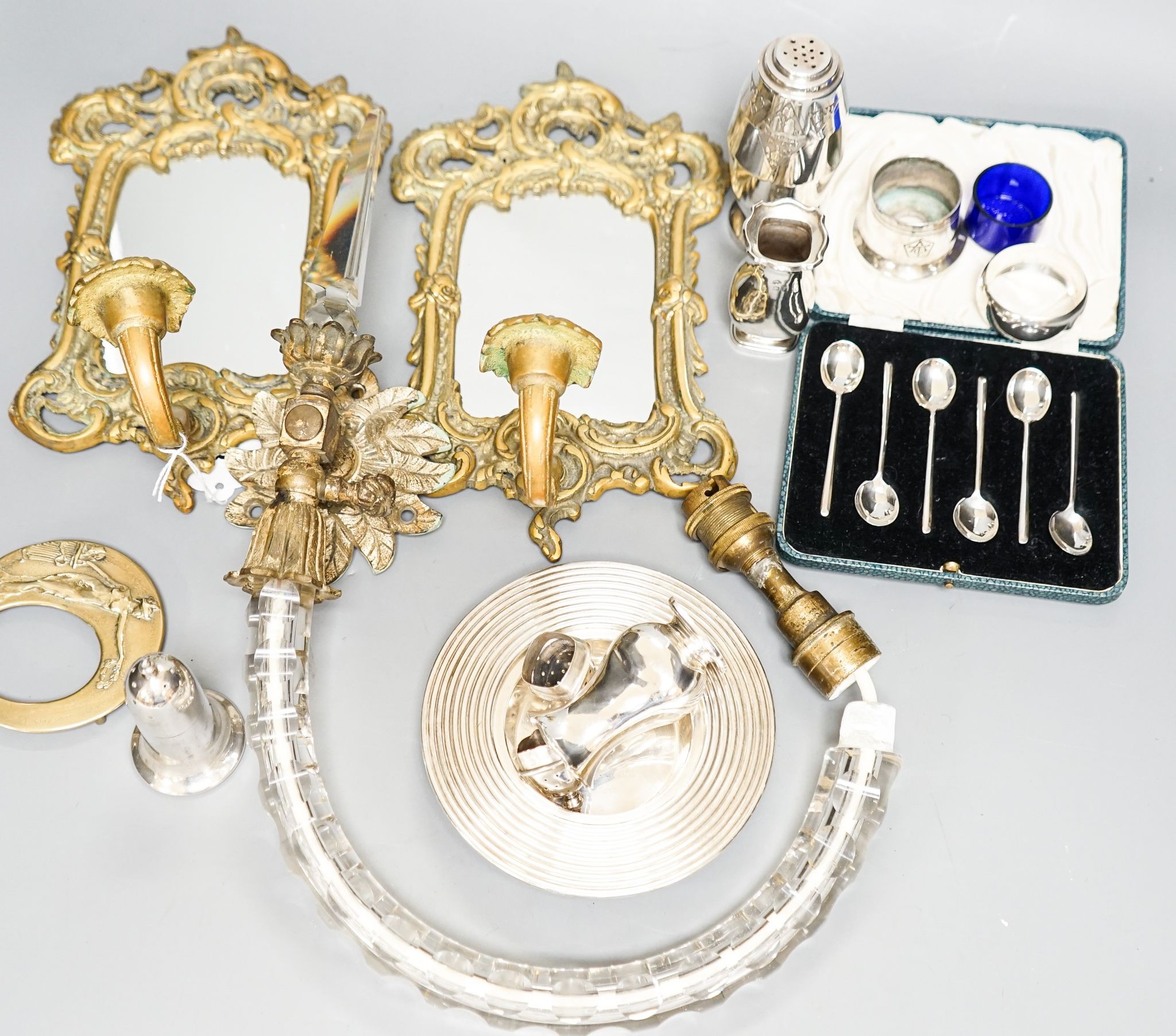 A pair of silver cruets and boxed spoons, various plate and a pair of wall mirrors and a glass wall light